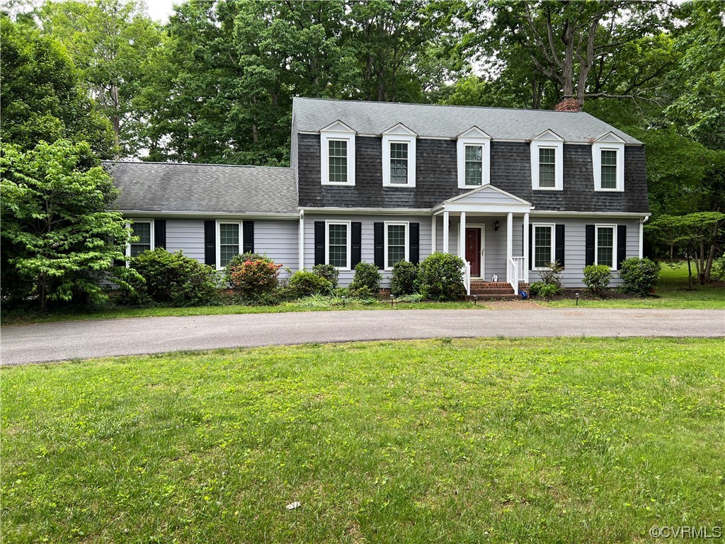 2620 Salisbury Road Midlothian, VA 23113 - Photo 35 of 36 a front view of a house with garden and trees