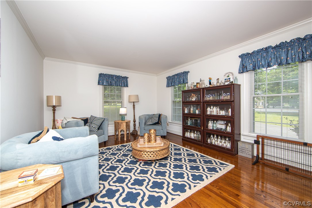 2620 Salisbury Road Midlothian, VA 23113 - Photo 7 of 36 a living room with furniture a rug and a table