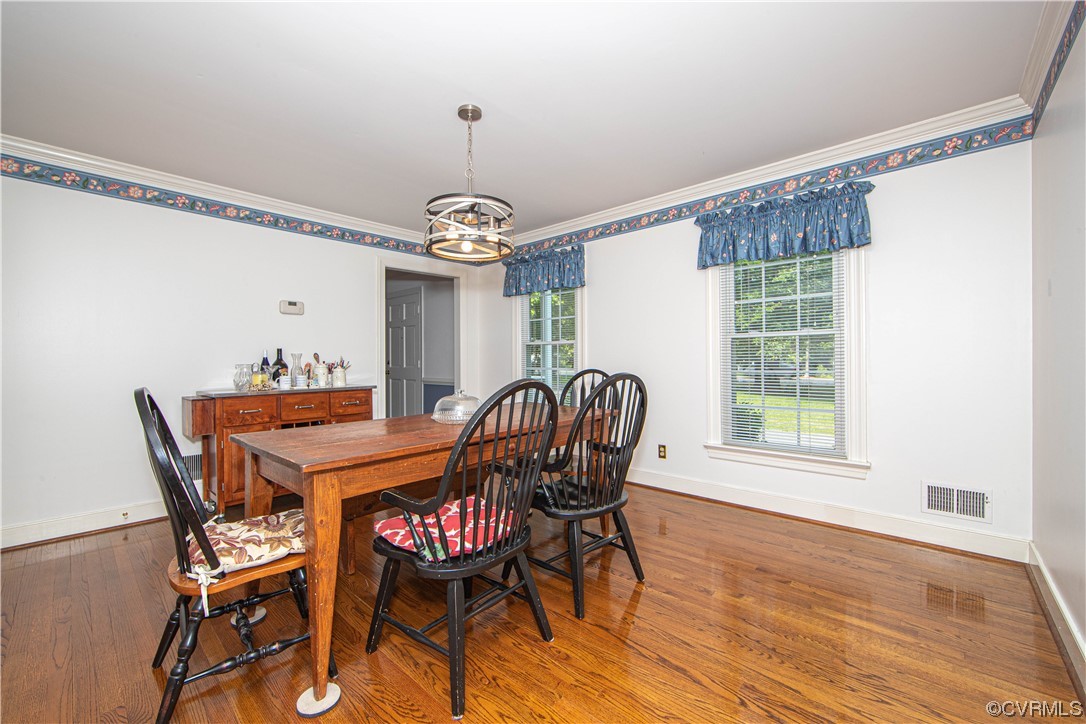2620 Salisbury Road Midlothian, VA 23113 - Photo 8 of 36 a view of a dining room with furniture window and wooden floor