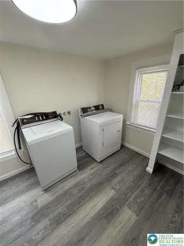 a utility room with washer and dryer