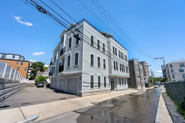 a view of a building with a street