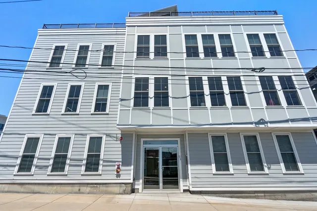 a large building with a street