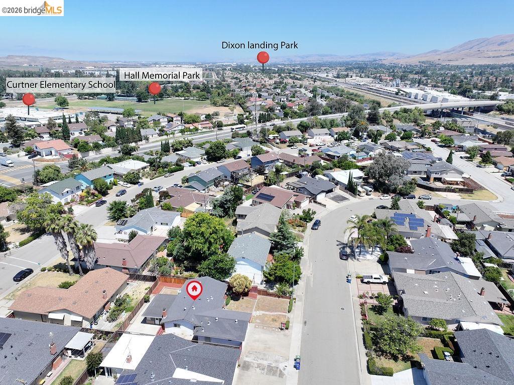805 Calero Street Milpitas, CA 95035 - Photo 23 of 23 Aerial perspective showcasing a residential neighborhood with varied architectural styles and established landscaping