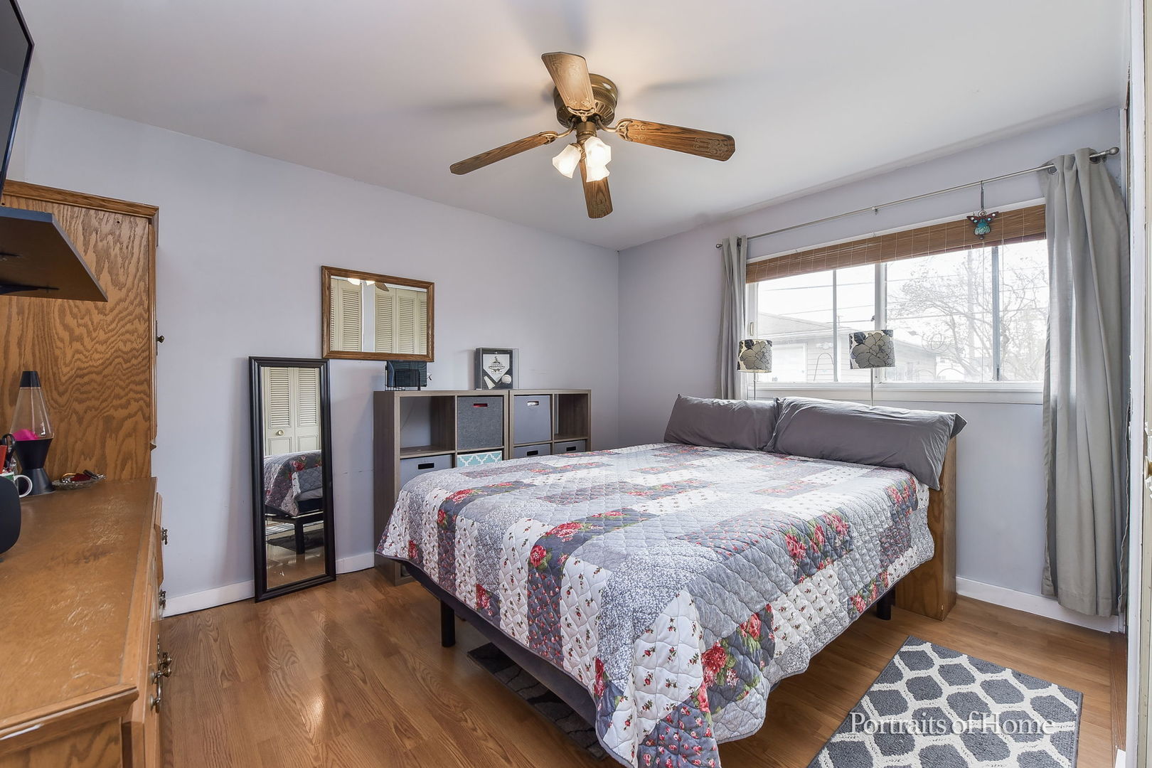 78 Saugatuck Road Montgomery, IL 60538 - Photo 15 of 21 a bedroom with a bed and a chandelier