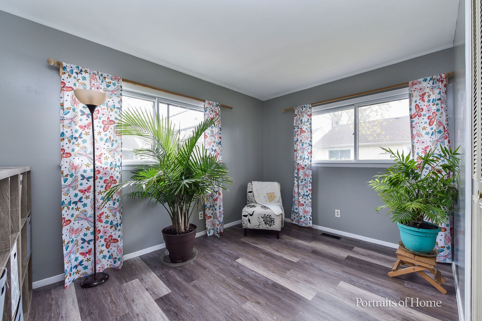 78 Saugatuck Road Montgomery, IL 60538 - Photo 16 of 21 a living room with furniture and a potted plant