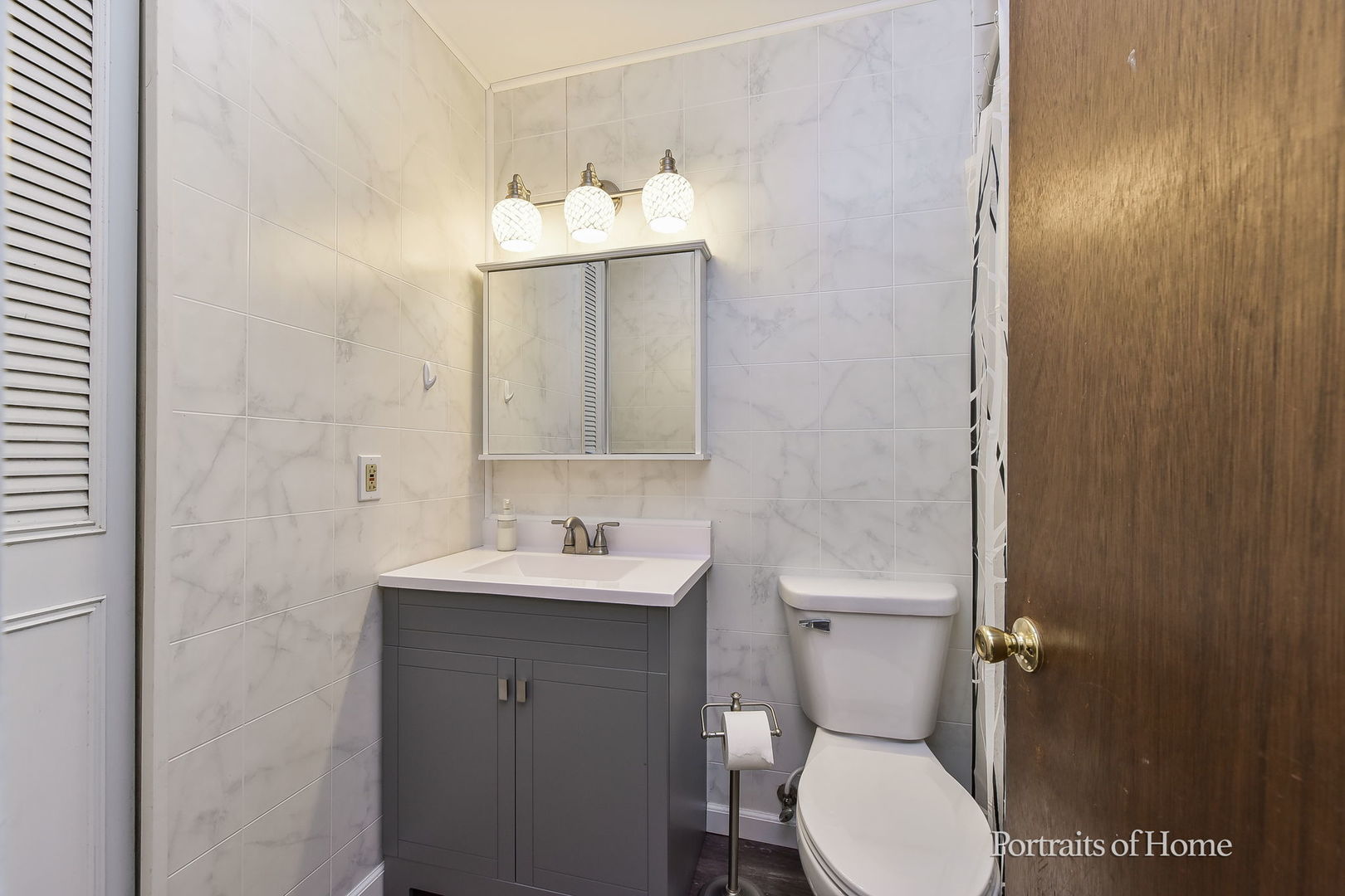 78 Saugatuck Road Montgomery, IL 60538 - Photo 17 of 21 a bathroom with a toilet a sink and mirror