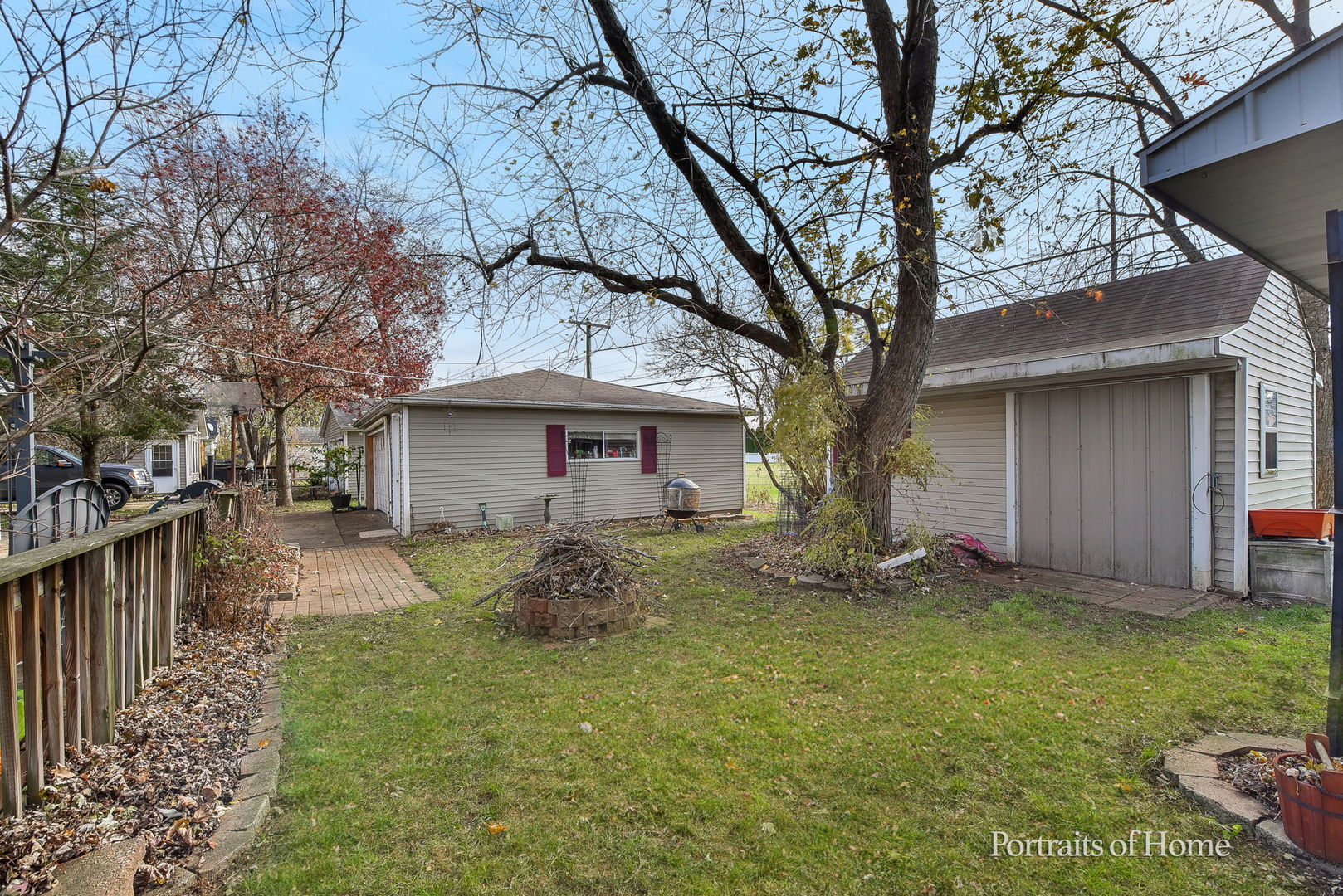 78 Saugatuck Road Montgomery, IL 60538 - Photo 21 of 21 a view of a house with a yard and large tree