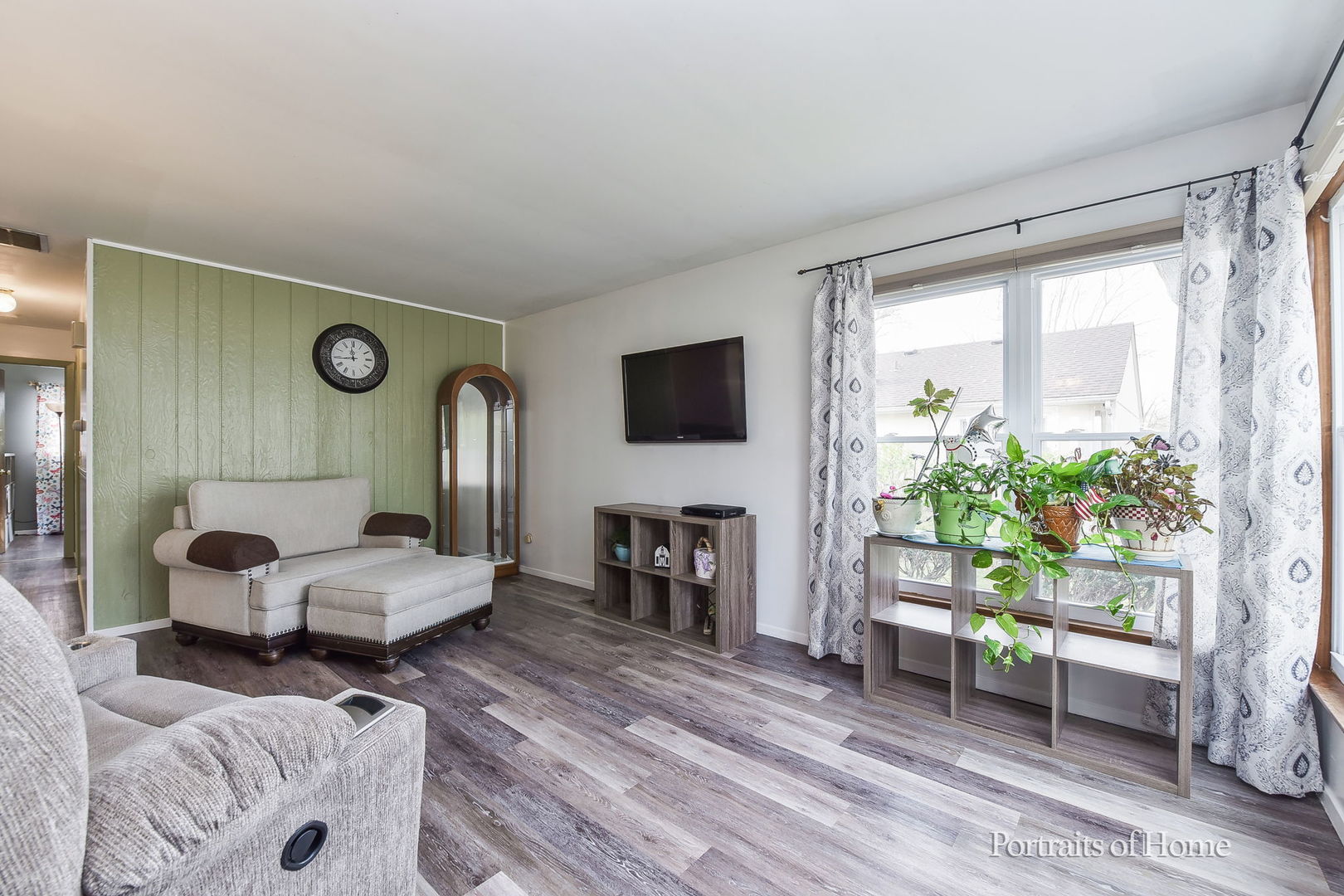 78 Saugatuck Road Montgomery, IL 60538 - Photo 7 of 21 a living room with furniture and a flat screen tv