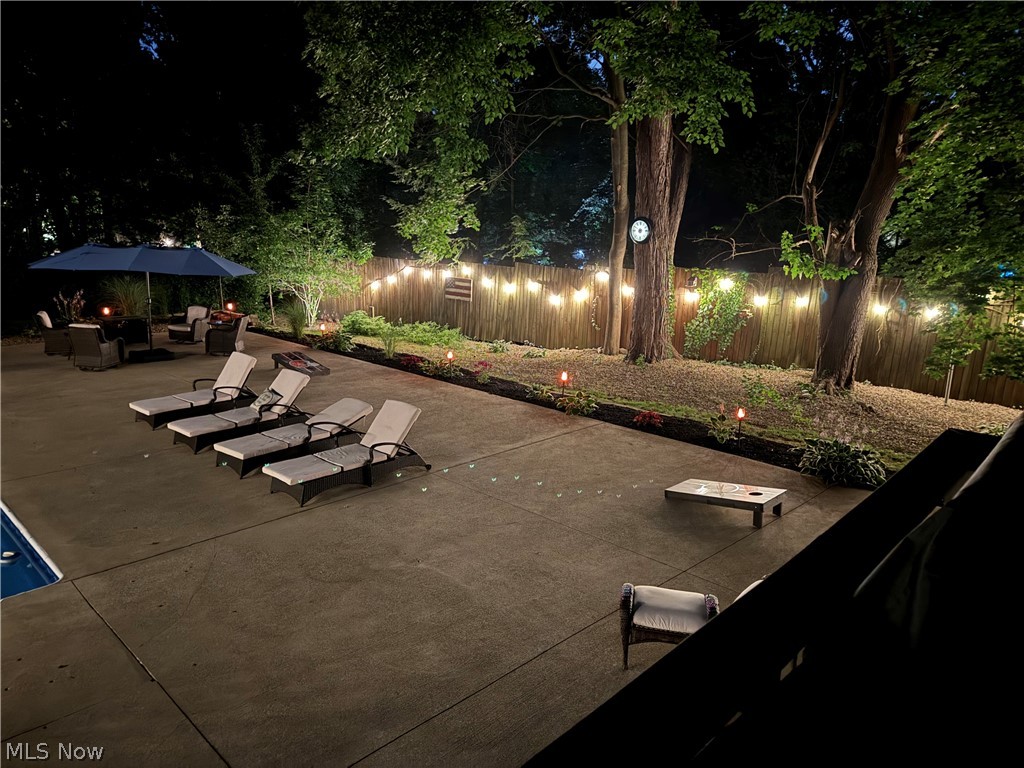 443 Merriman Road Akron, OH 44303 - Photo 41 of 44 Spacious concrete patio featuring four lounge chairs and an adjacent shaded seating area
