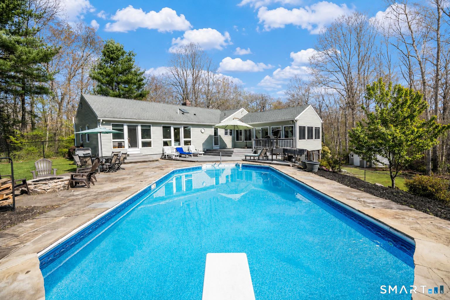 193 R Blue Hills Road Durham, CT 06422 - Photo 2 of 30 a swimming pool view with a seating space and a garden view