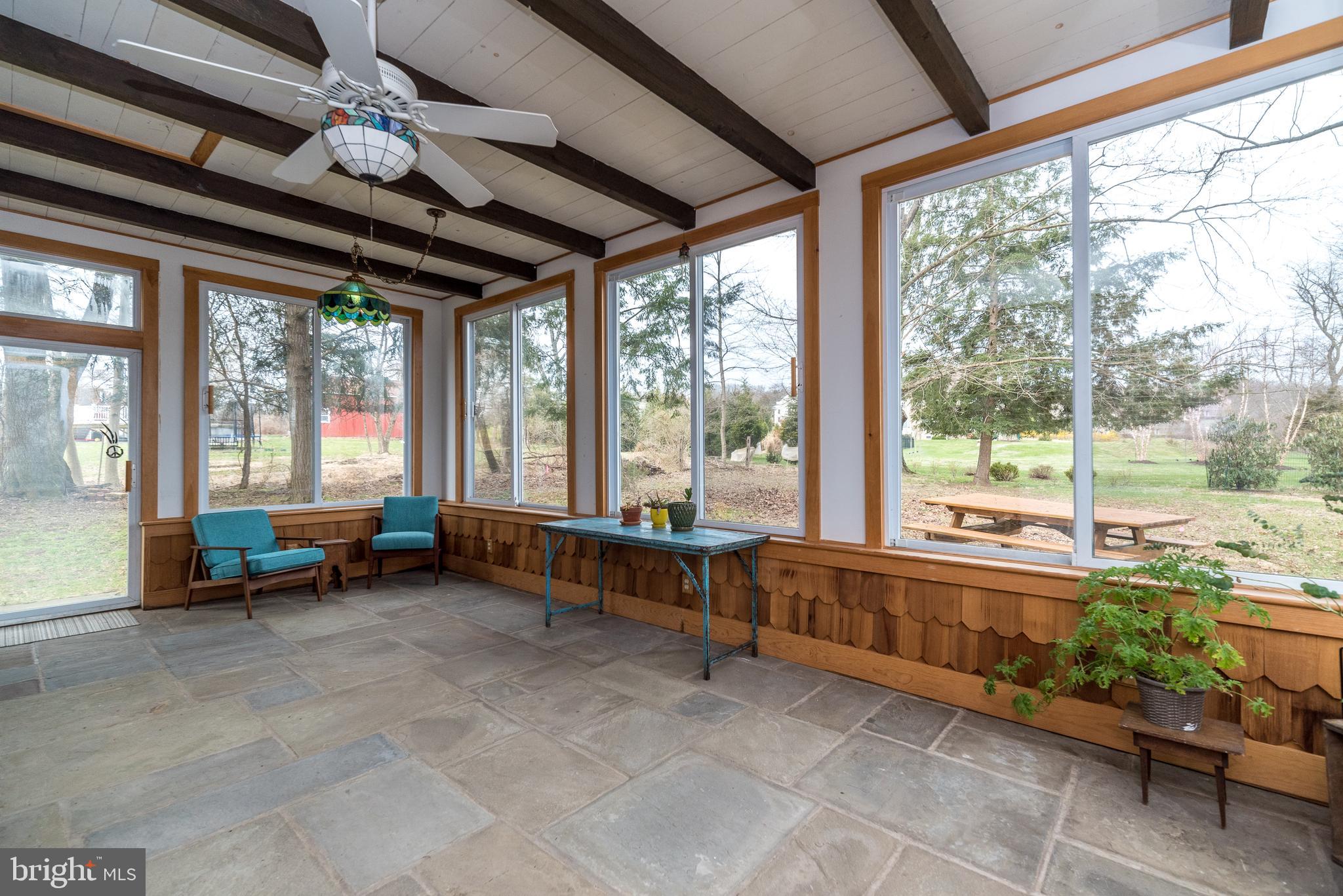 114 Headquarters Road Erwinna, PA 18920 - Photo 19 of 39 Sunroom with view of the backyard