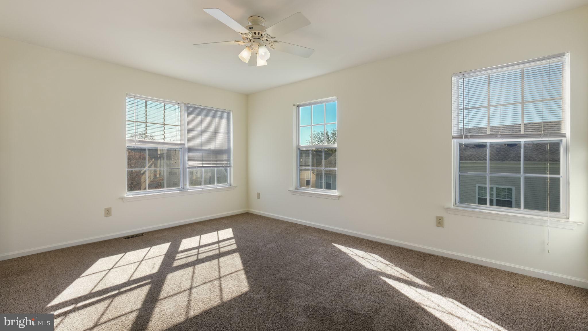 5480 Rinker Circle Doylestown, PA 18902 - Photo 17 of 23 an empty room with windows