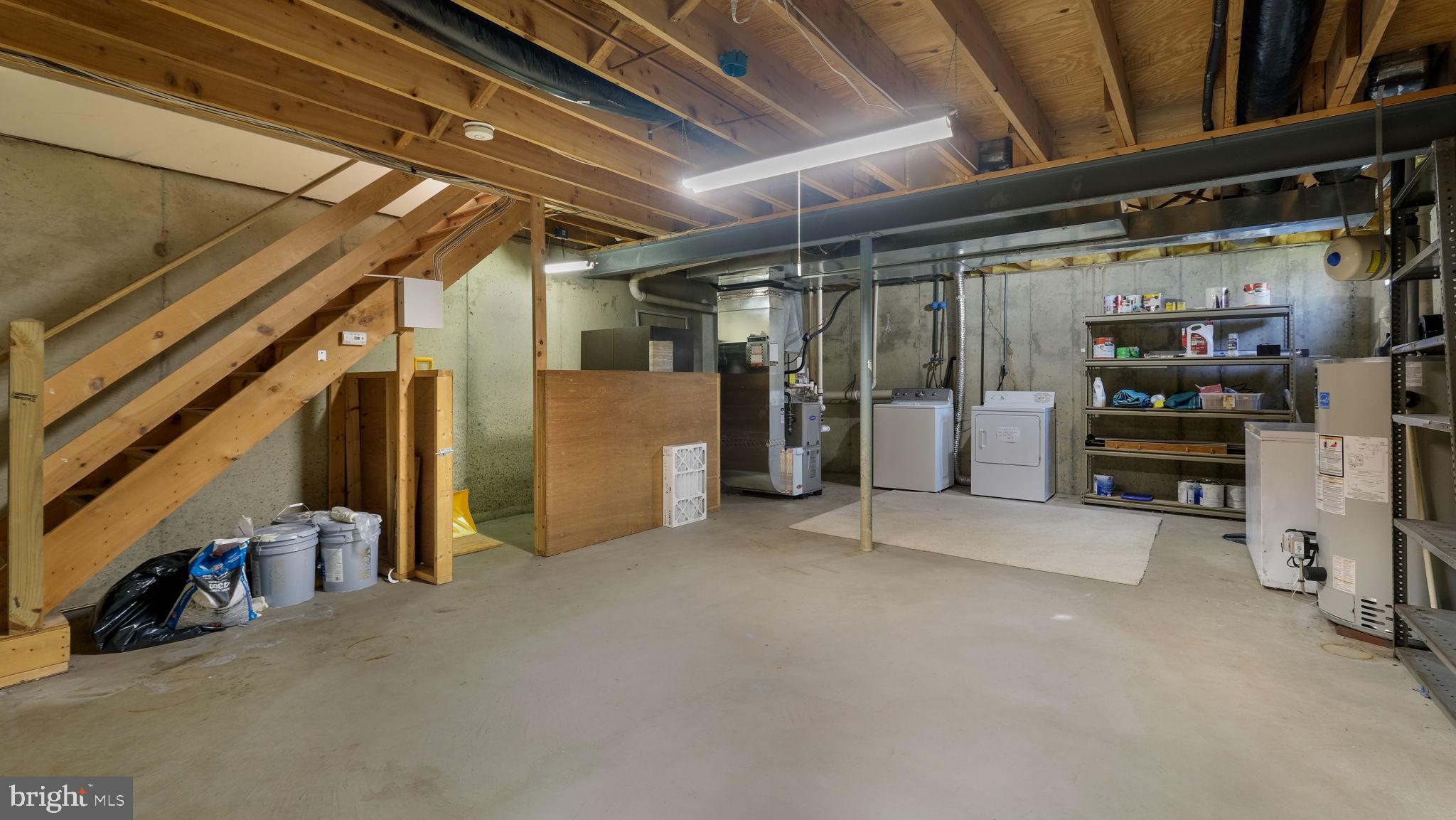 5480 Rinker Circle Doylestown, PA 18902 - Photo 20 of 23 a view of water heater room with refrigerator