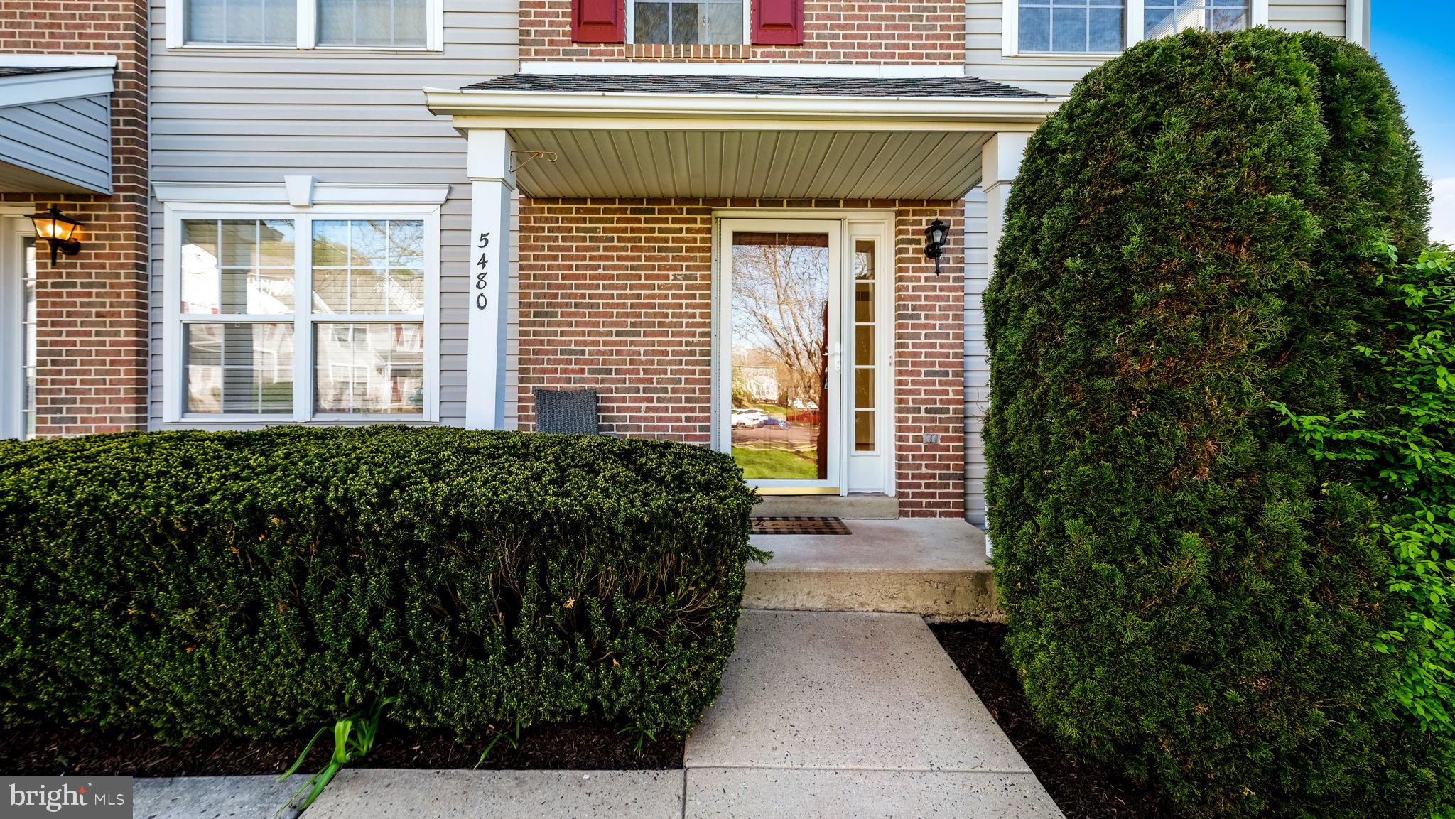 5480 Rinker Circle Doylestown, PA 18902 - Photo 3 of 23 a potted plant sitting in front of a house