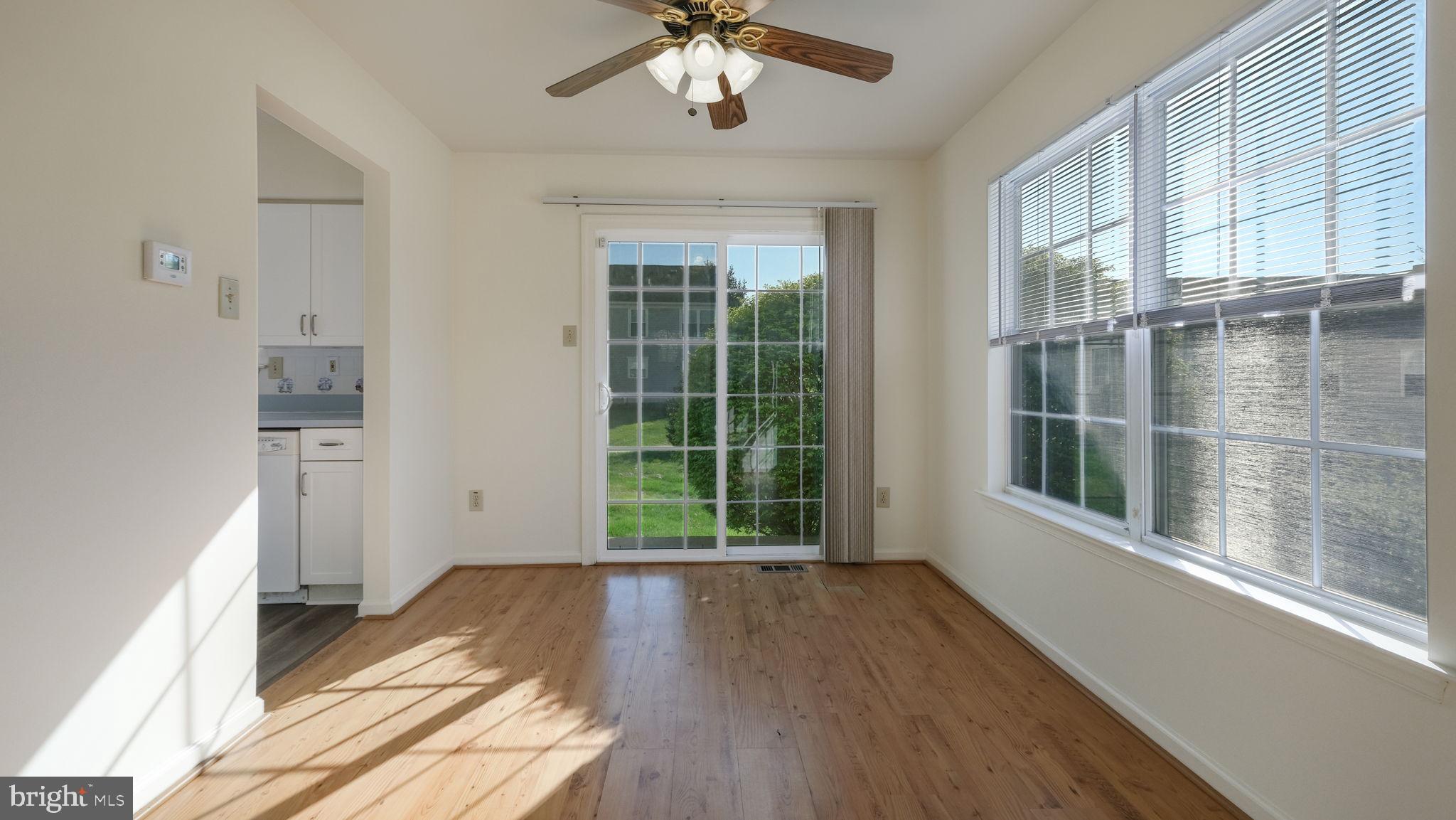 5480 Rinker Circle Doylestown, PA 18902 - Photo 8 of 23 wooden floor in an empty room with a window