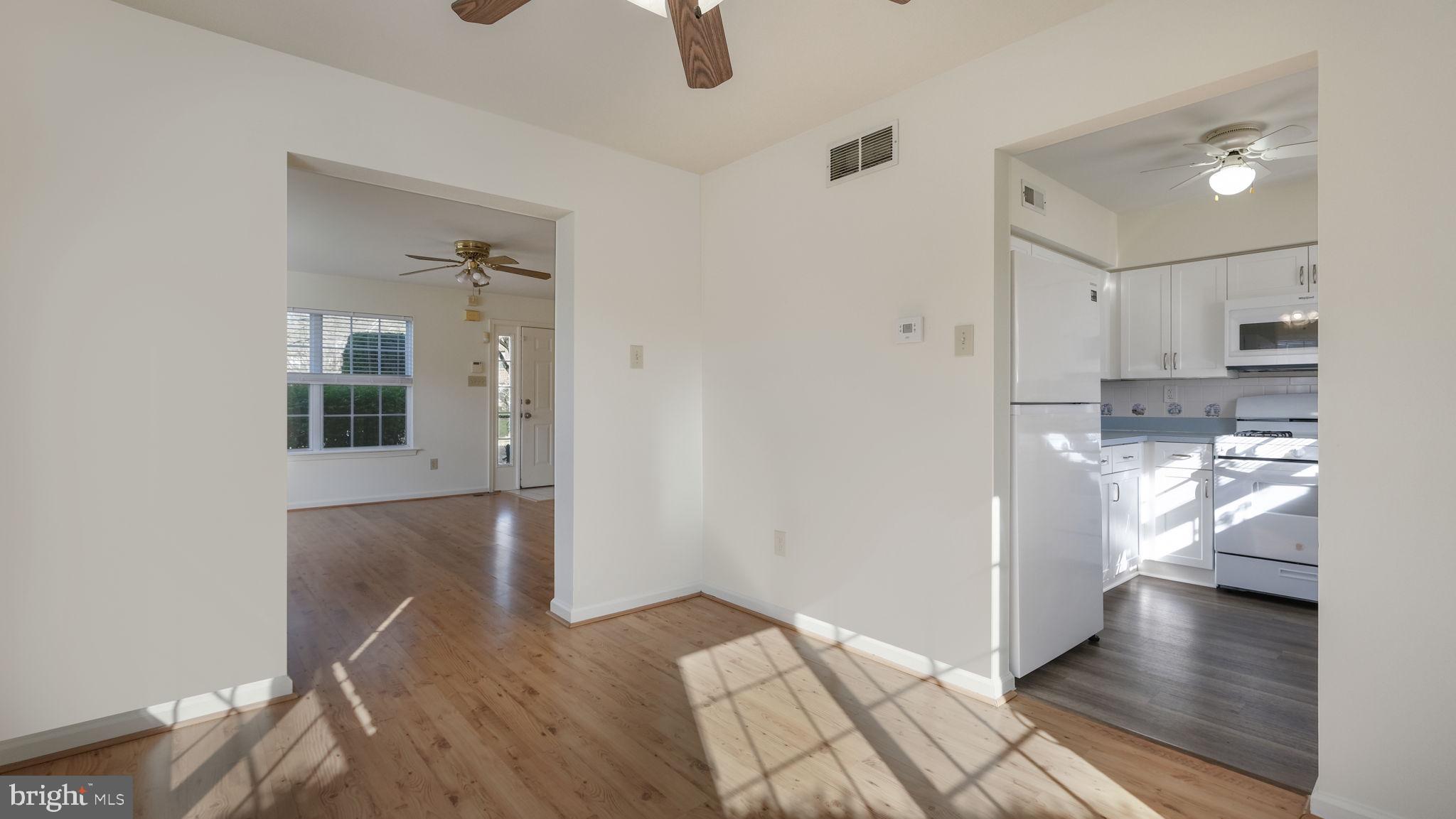 5480 Rinker Circle Doylestown, PA 18902 - Photo 9 of 23 a view of hallway with wooden floor