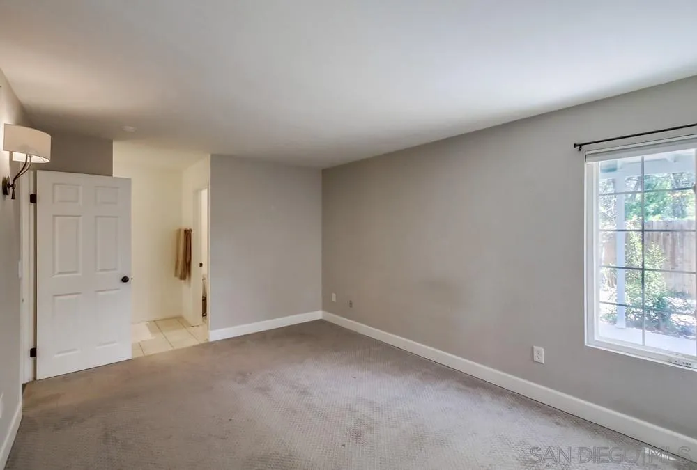 14759 Alando Place Poway, CA 92064 - Photo 12 of 30 a view of an empty room with a window