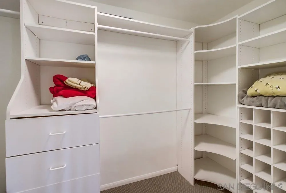 14759 Alando Place Poway, CA 92064 - Photo 17 of 30 a view of an empty walk in closet