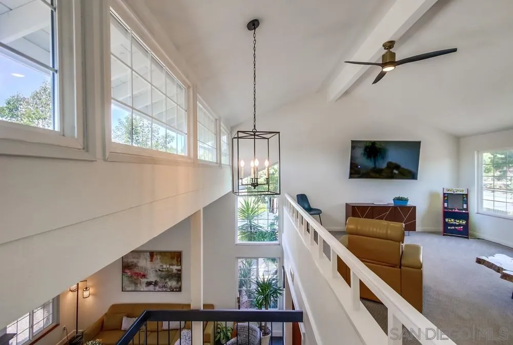 14759 Alando Place Poway, CA 92064 - Photo 22 of 30 a living room with furniture and a flat screen tv