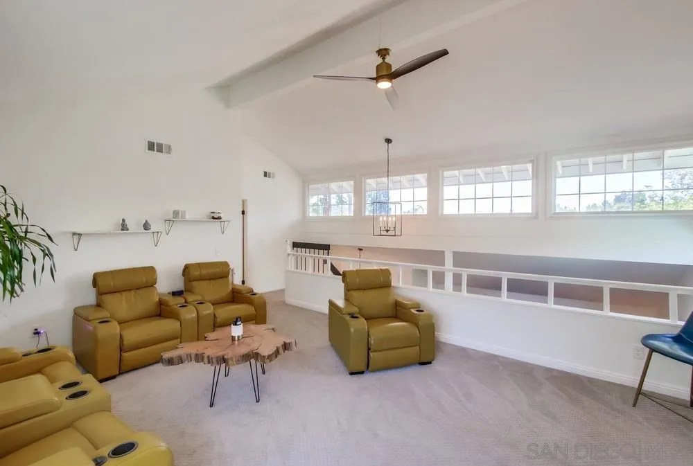 14759 Alando Place Poway, CA 92064 - Photo 23 of 30 a living room with furniture and a large window