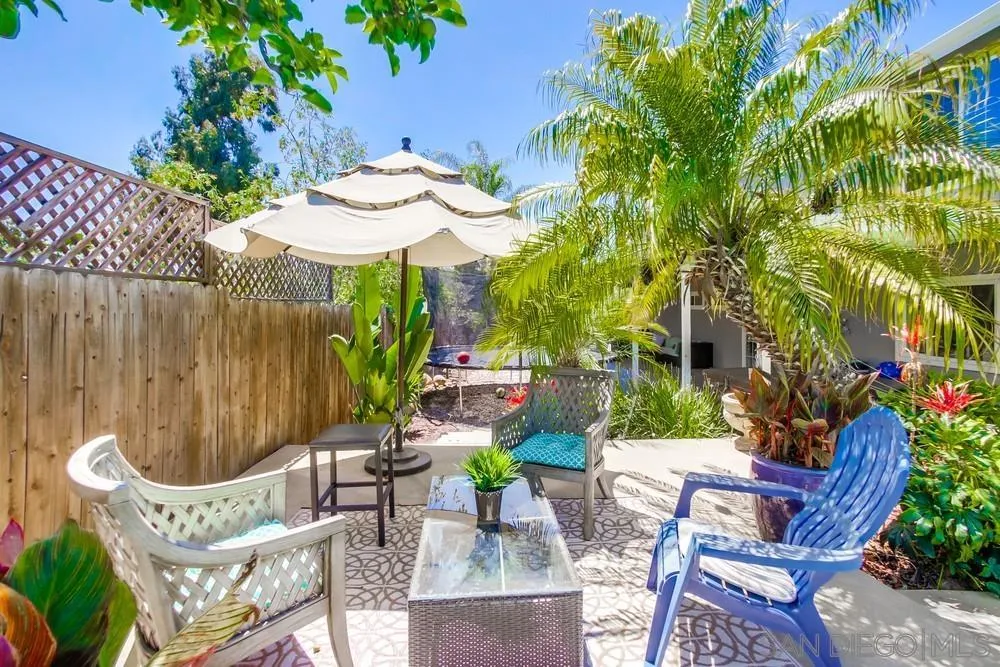 14759 Alando Place Poway, CA 92064 - Photo 27 of 30 a view of a chair and table in backyard