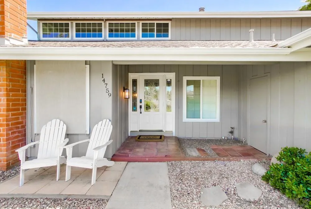 14759 Alando Place Poway, CA 92064 - Photo 3 of 30 a view of a chair and table in the house