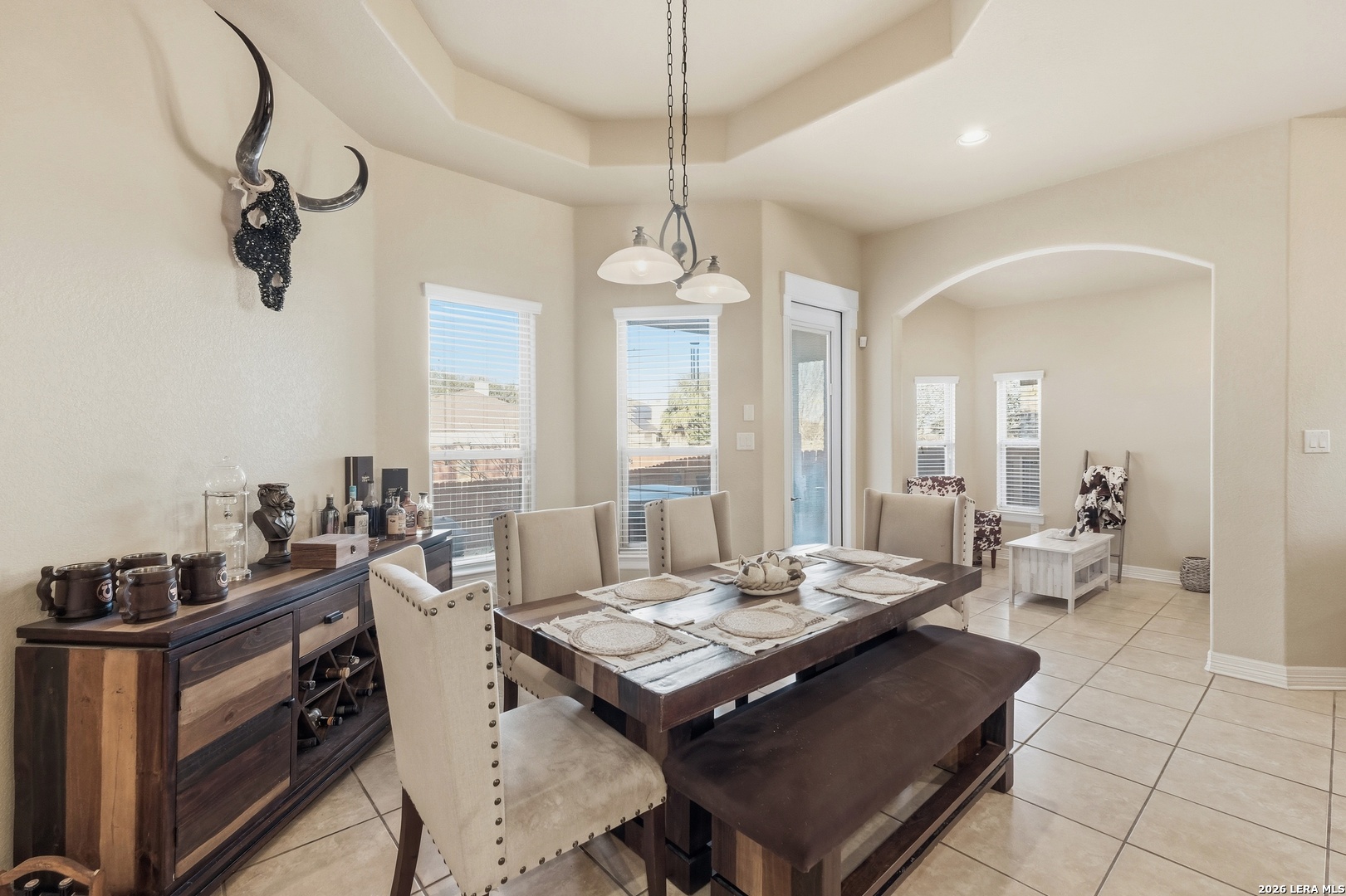 14715 Rifleman Road San Antonio, TX 78254 - Photo 15 of 30 a living room with furniture a window and a chandelier