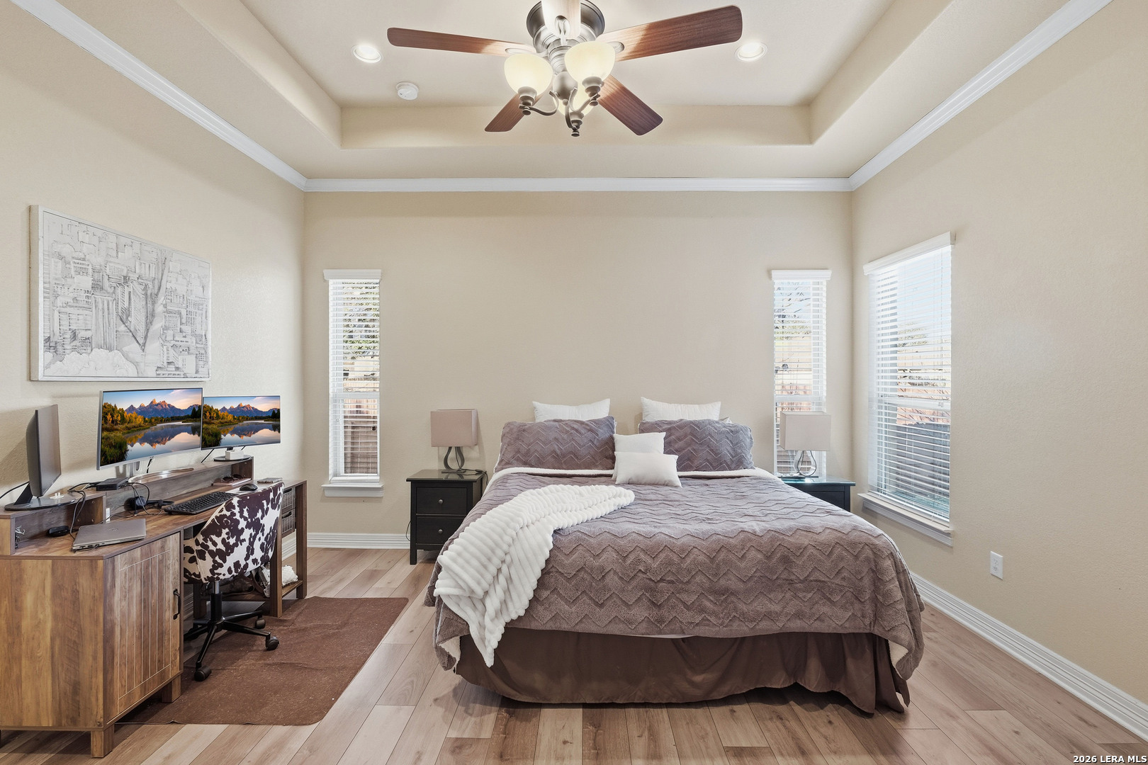 14715 Rifleman Road San Antonio, TX 78254 - Photo 16 of 30 a bedroom with bed a chandelier and a window
