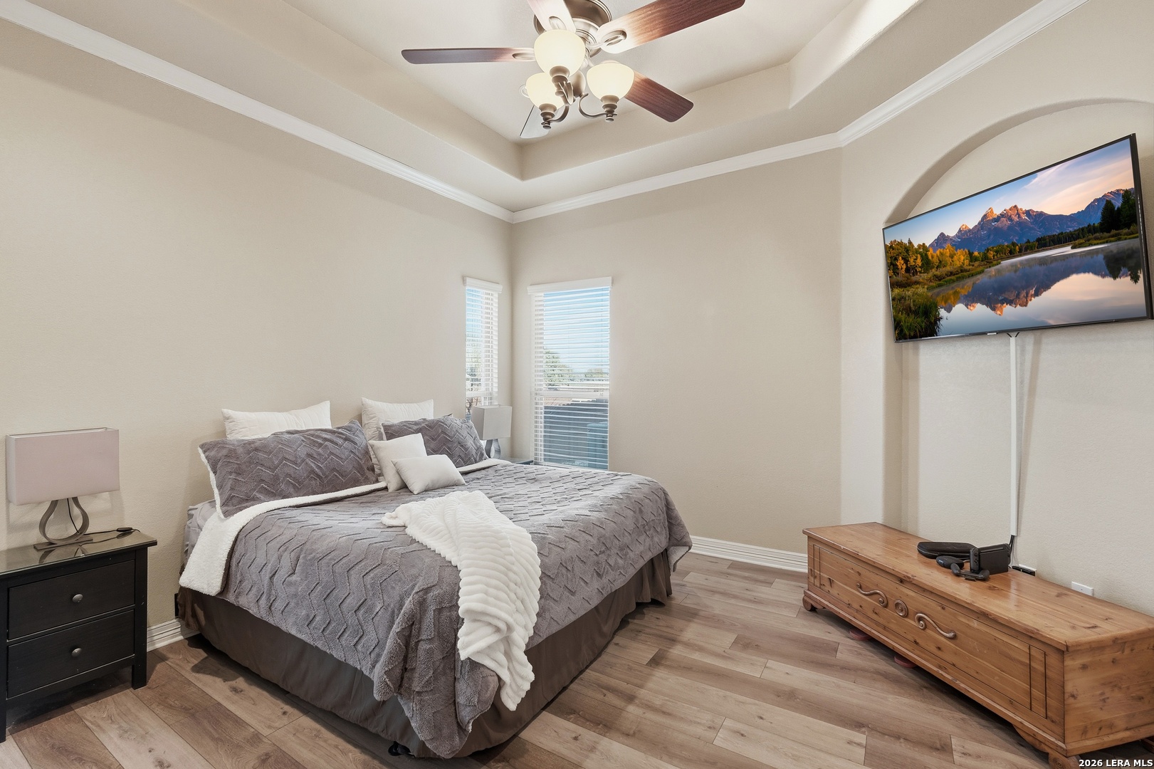 14715 Rifleman Road San Antonio, TX 78254 - Photo 17 of 30 a bedroom with a bed and ceiling fan