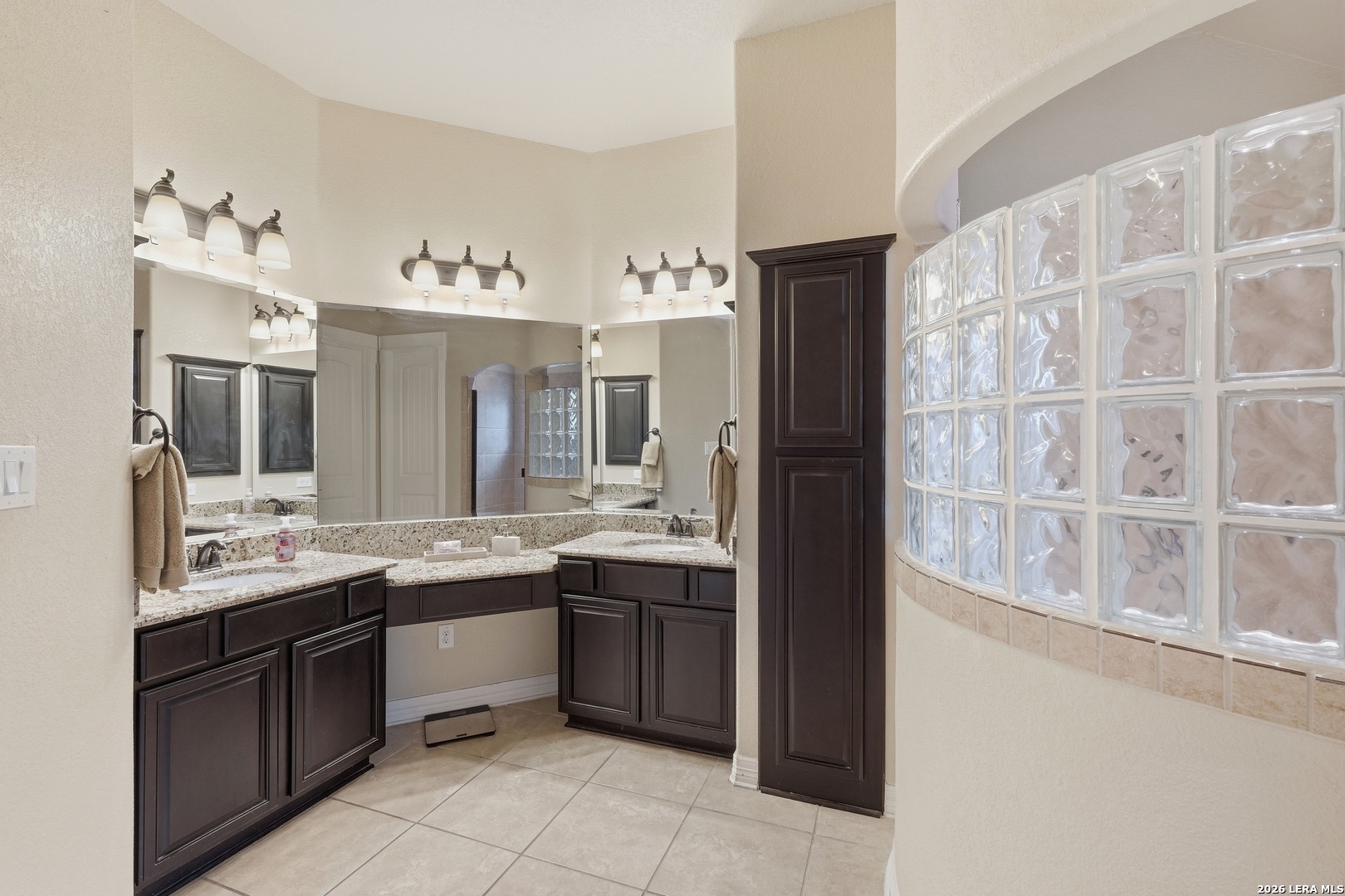 14715 Rifleman Road San Antonio, TX 78254 - Photo 19 of 30 a large kitchen with a sink and dishwasher a refrigerator with wooden floor