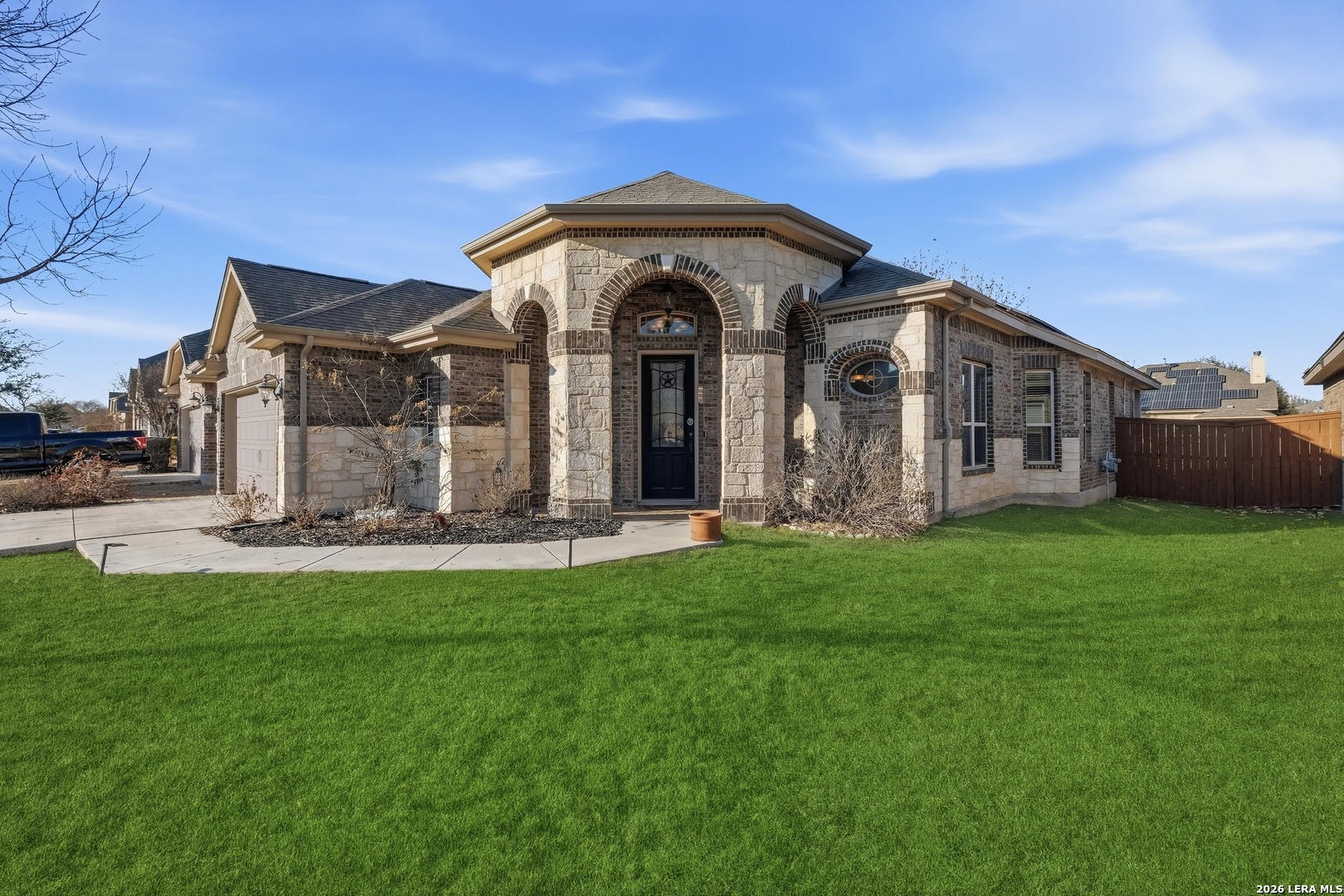 14715 Rifleman Road San Antonio, TX 78254 - Photo 2 of 30 a front view of a house with garden
