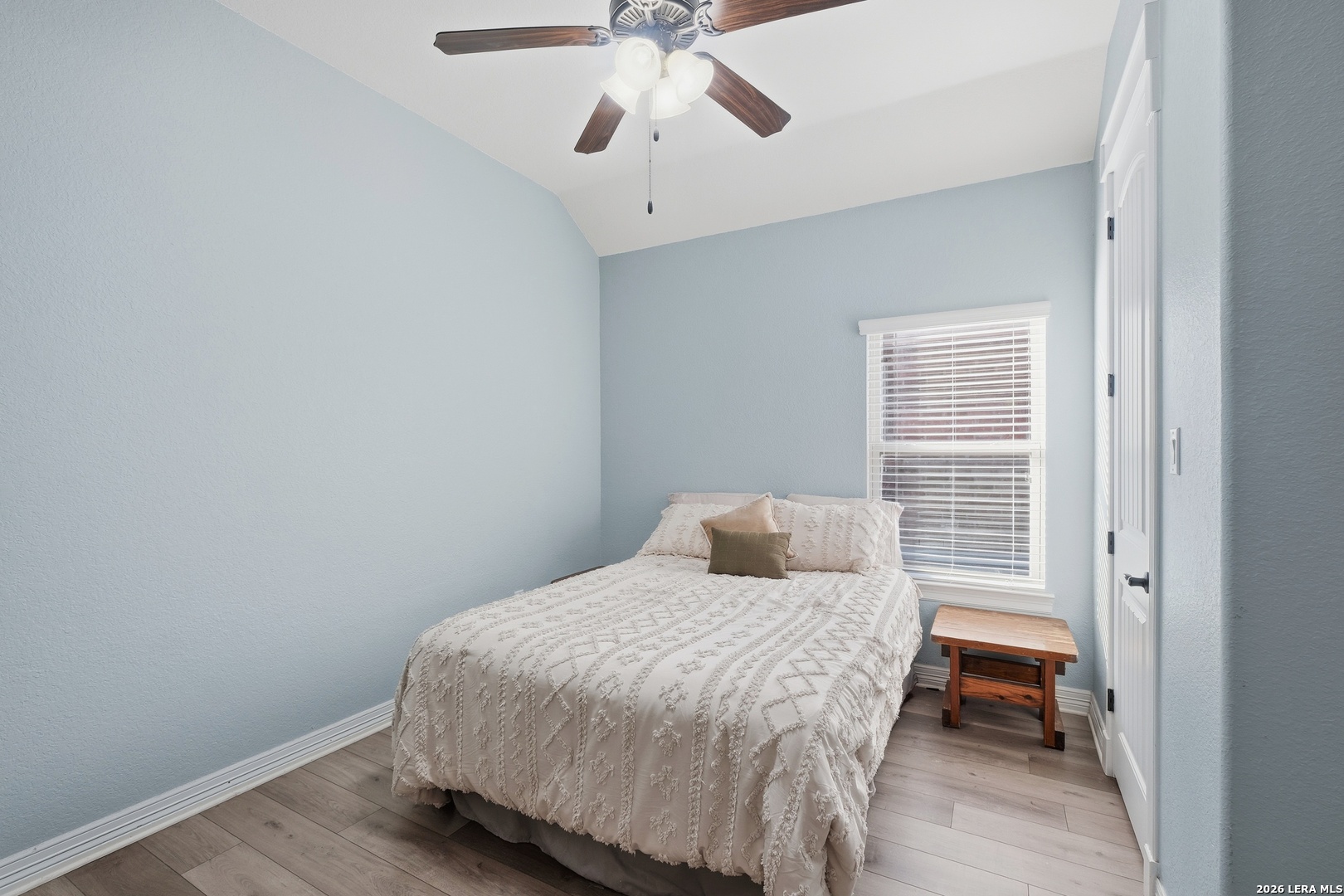 14715 Rifleman Road San Antonio, TX 78254 - Photo 24 of 30 a bedroom with a bed and a window