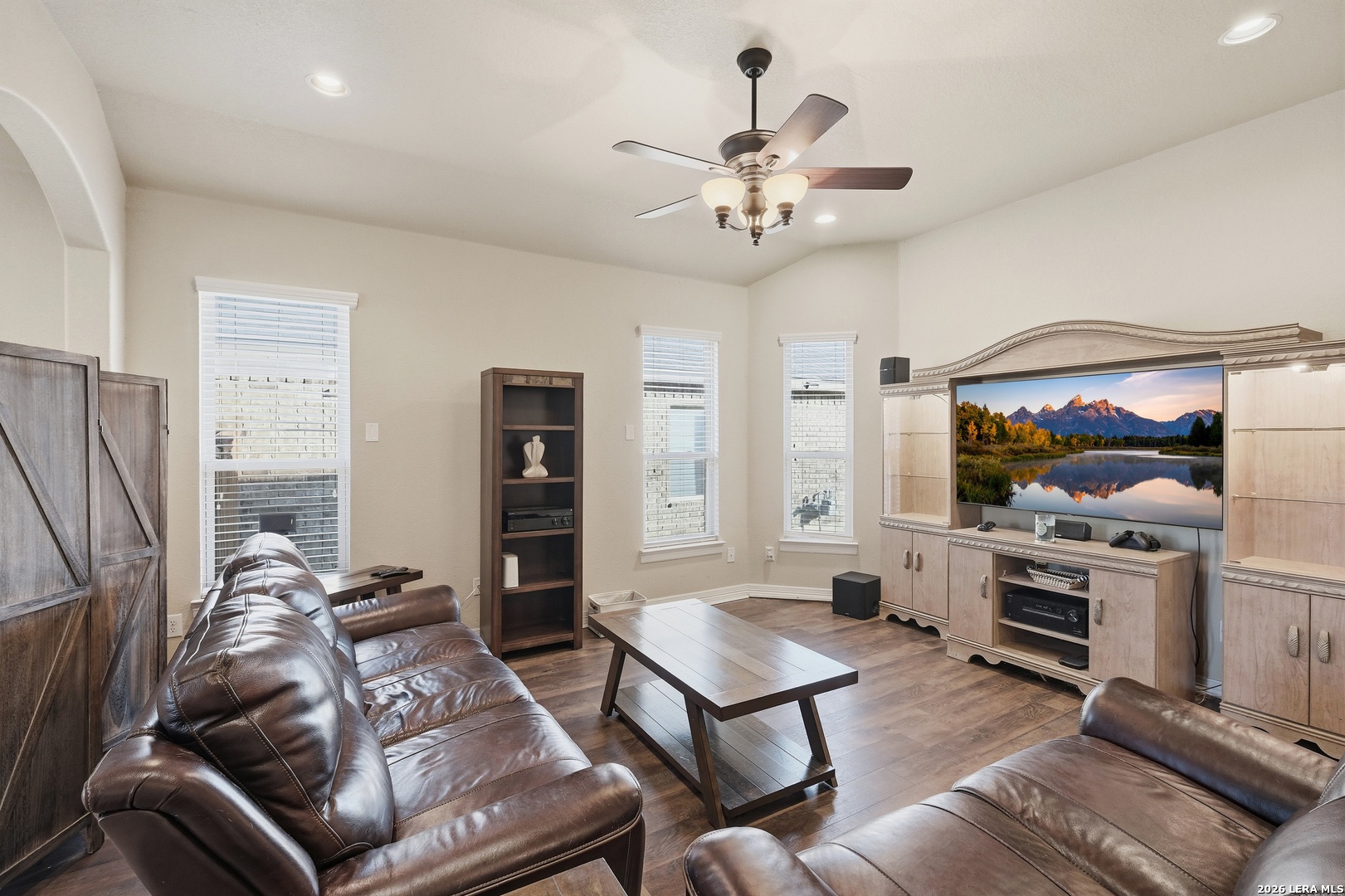 14715 Rifleman Road San Antonio, TX 78254 - Photo 6 of 30 a living room with furniture kitchen view and a refrigerator
