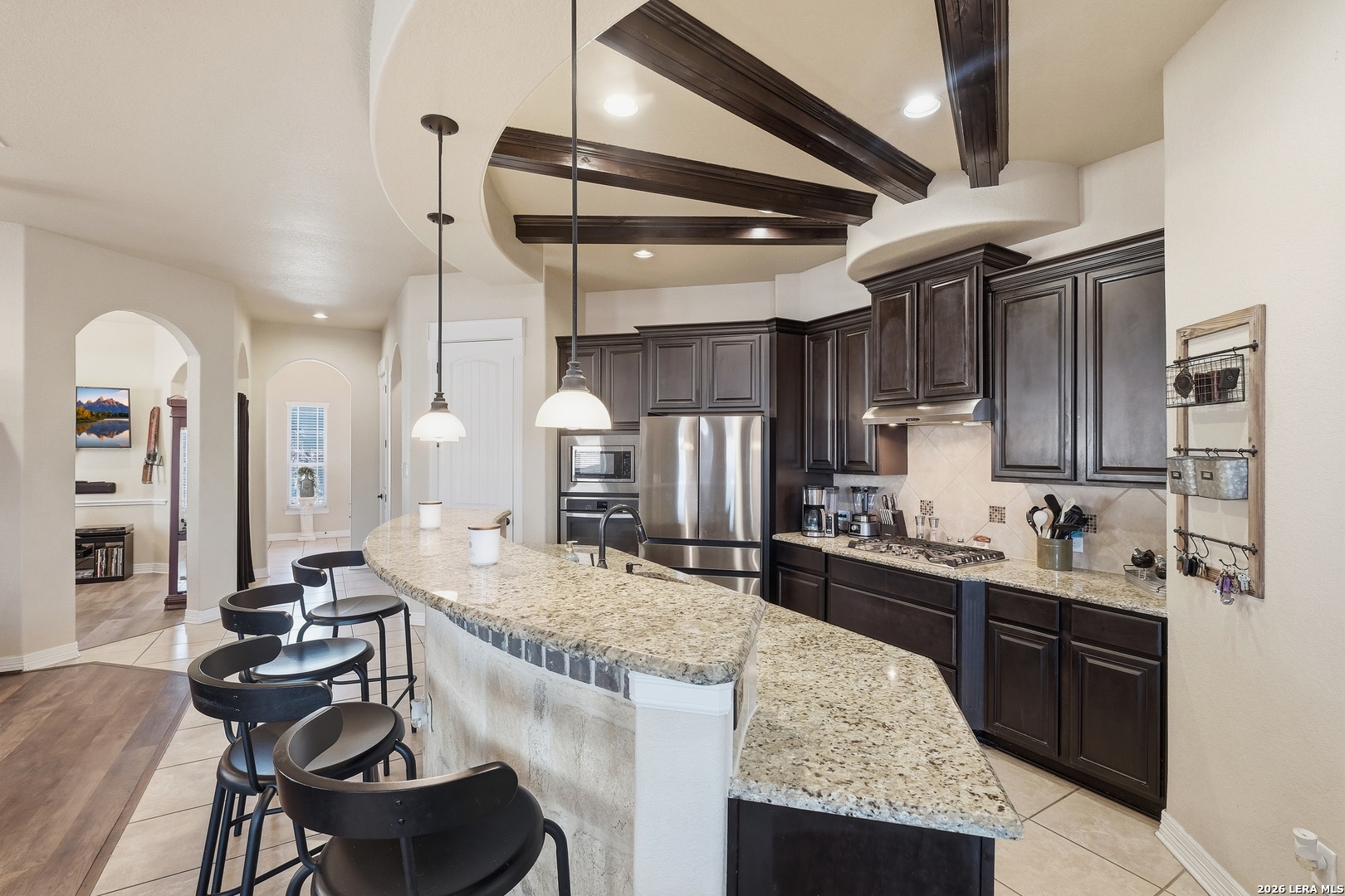 14715 Rifleman Road San Antonio, TX 78254 - Photo 8 of 30 a large kitchen with a table and chairs