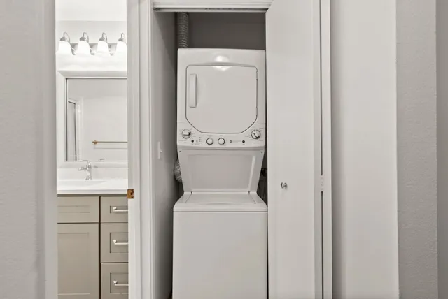 a utility room with dryer and washer