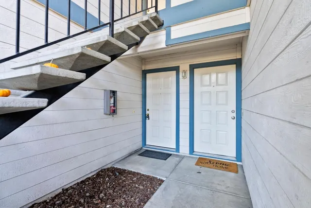 a view of a car park in front of house