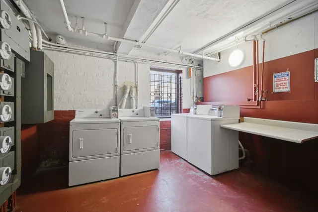 a room with sink cabinets and furniture