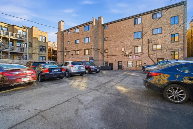 a car parked in front of a building