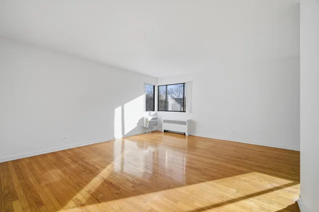 a view of empty room with a sink and dishwasher