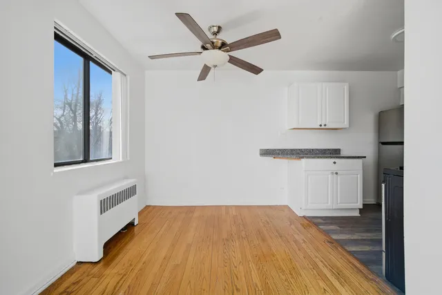 a hallway with cabinets