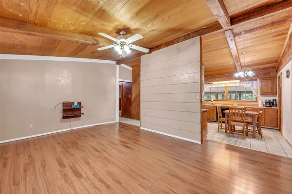 a view of a livingroom with wooden floor