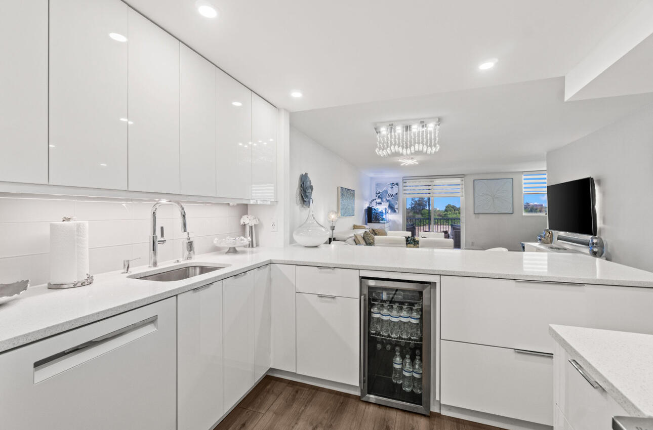 5500 Northwest 2nd Avenue, Unit 414 Boca Raton, FL 33487 - Photo 5 of 38 a kitchen with a sink and cabinets
