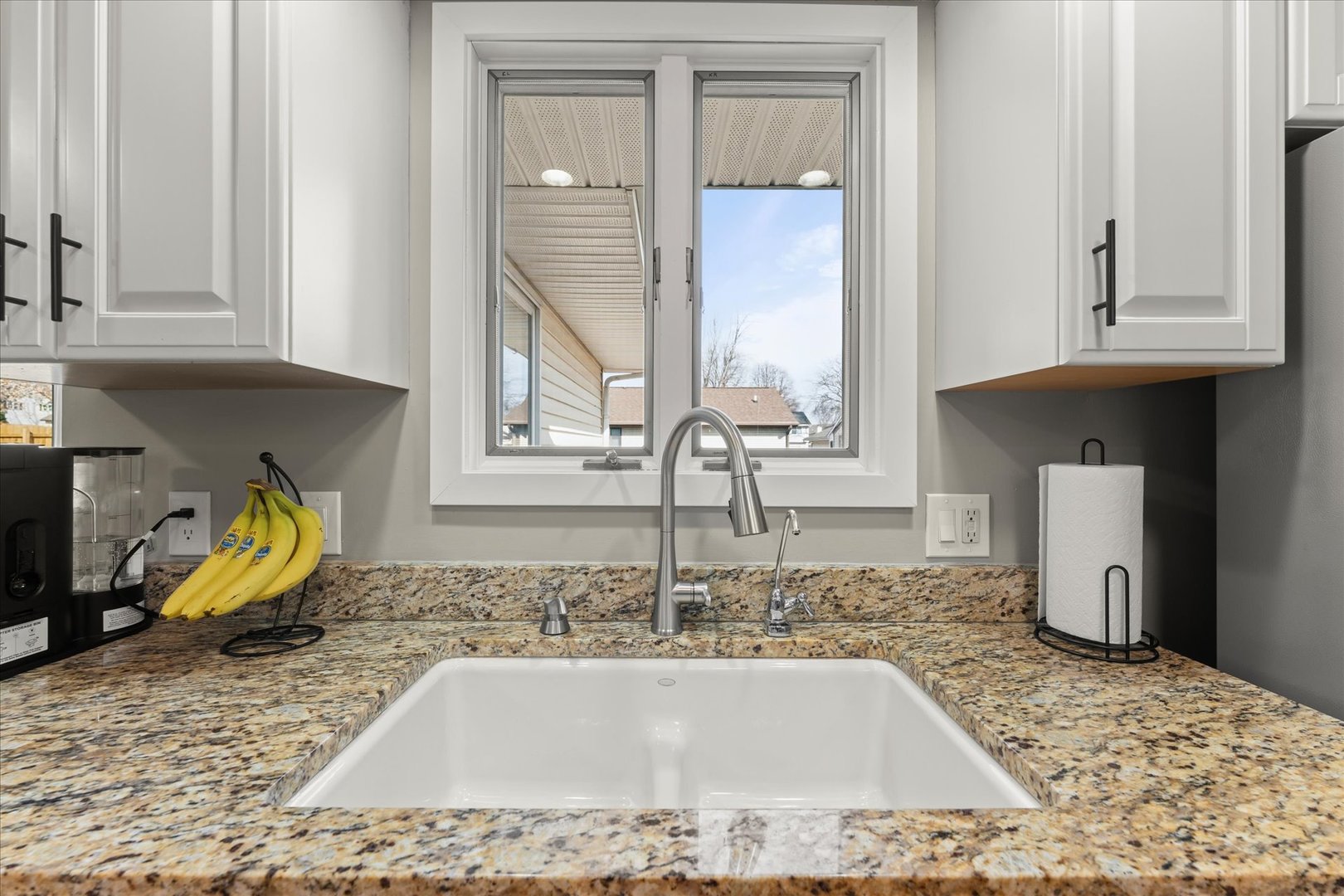 2608 Rachel Road Champaign, IL 61822 - Photo 13 of 47 a bathroom with a granite countertop sink and a mirror