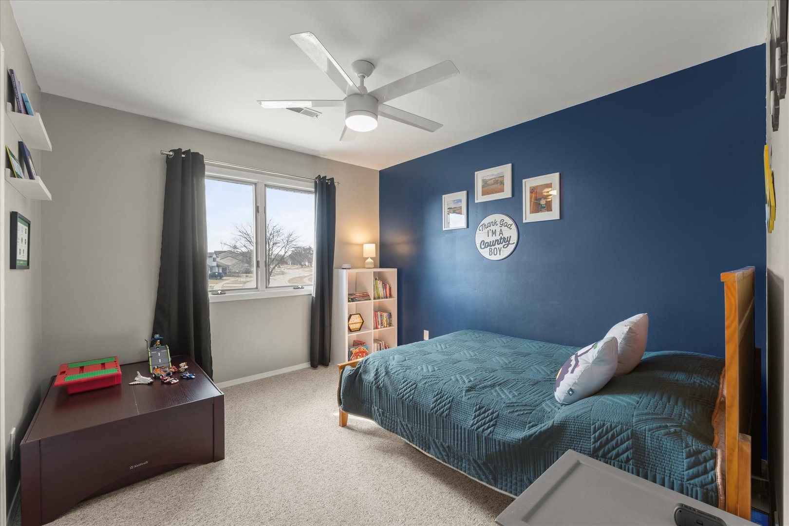 2608 Rachel Road Champaign, IL 61822 - Photo 29 of 47 a bedroom with a bed and a chandelier