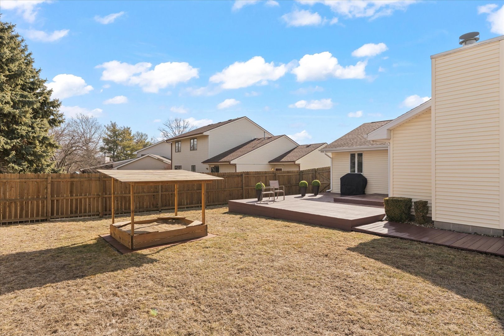 2608 Rachel Road Champaign, IL 61822 - Photo 33 of 47 a view of a house with backyard and sitting area