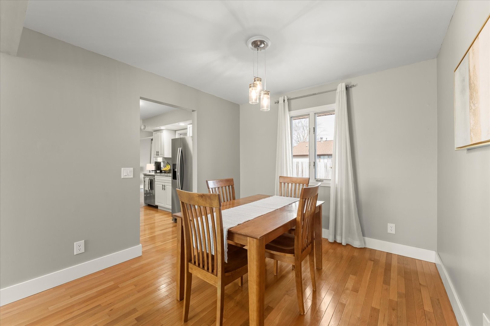 2608 Rachel Road Champaign, IL 61822 - Photo 9 of 47 a view of a dining room with furniture and wooden floor