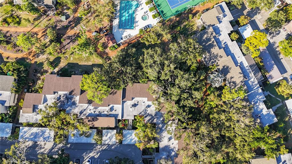 1508 Pelican Cove Road, Unit GR232 Sarasota, FL 34231 - Photo 28 of 54 an aerial view of a house with a yard