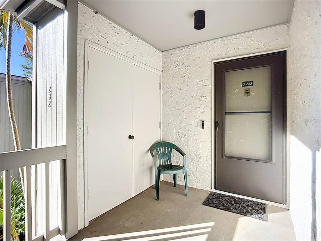 1508 Pelican Cove Road, Unit GR232 Sarasota, FL 34231 - Photo 5 of 54 a view of a hallway with a elevator