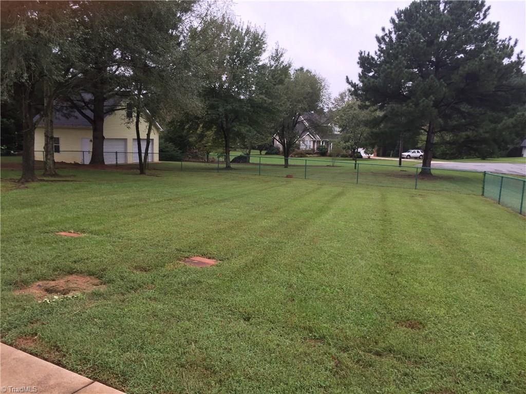 2612 Celeste Road Walkertown, NC 27051 - Photo 19 of 23 A large part of hte back yard is fenced plus there is a 2 car detached garage!