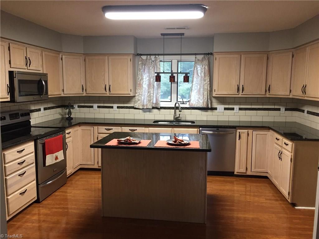 2612 Celeste Road Walkertown, NC 27051 - Photo 6 of 23 Lots of cabinets in the kitchen!